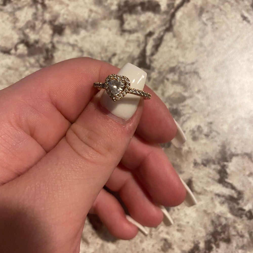 Rose gold ring with heart shaped stone